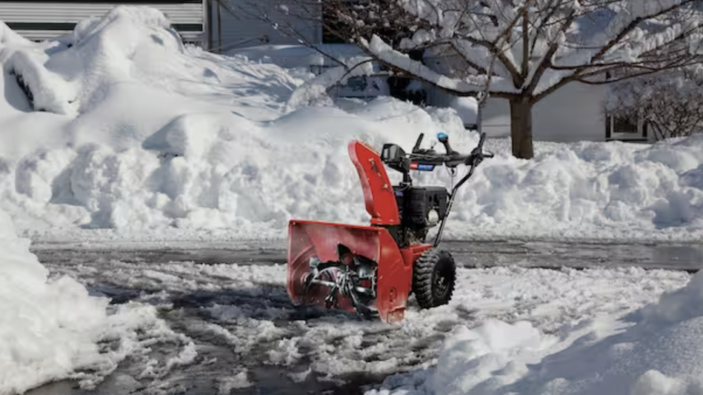 Snow Removal Equipment Explained: What Works Best and Where Snowblower clearing a residential driveway in Regina
