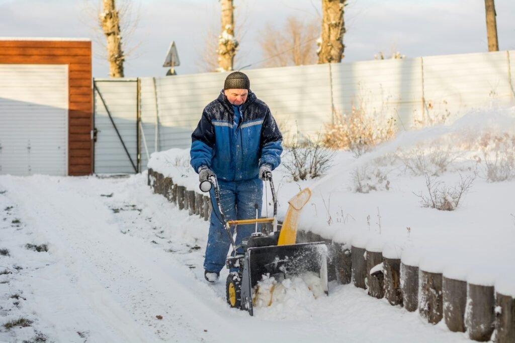 Snow Removal in The Creeks, Regina snowblower at work